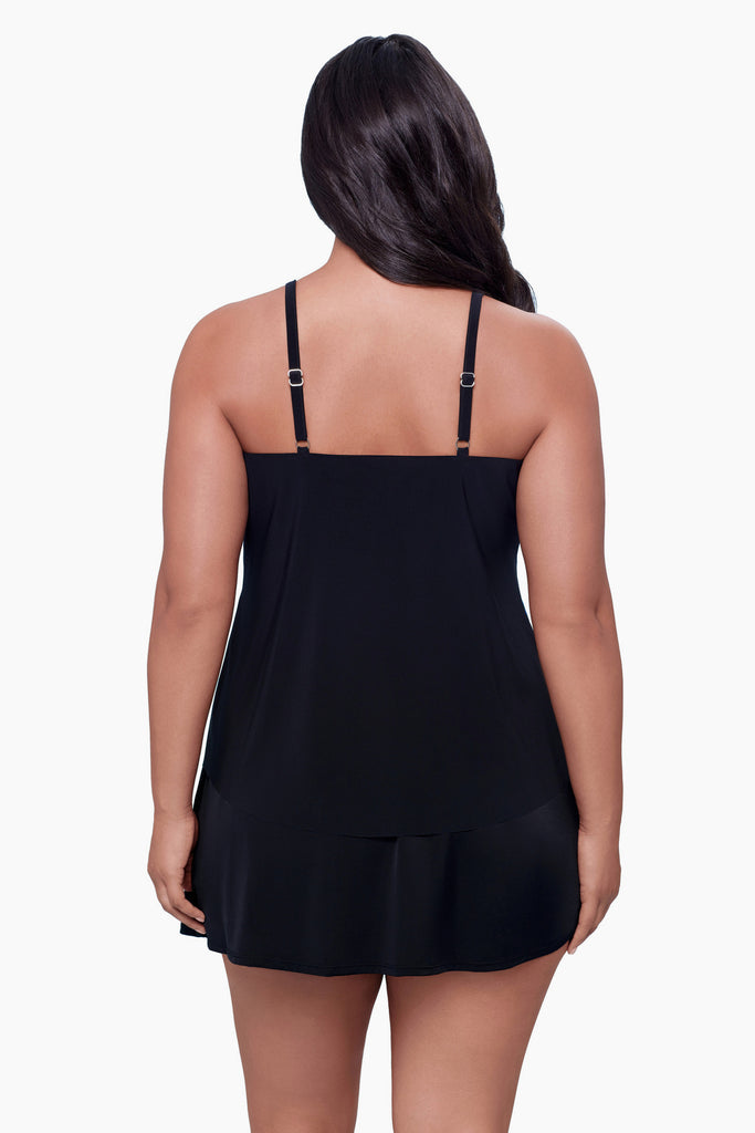 Woman turned away wearing a tankini top 
