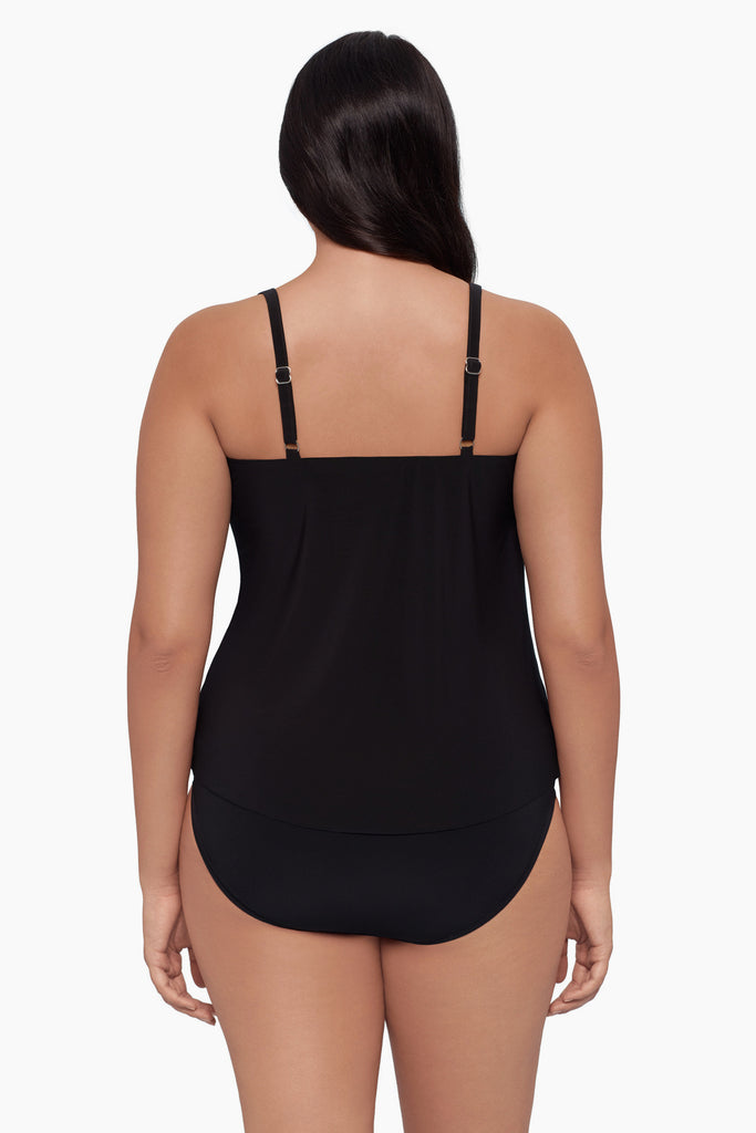 Woman turned away wearing a tankini top 