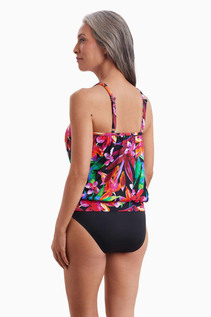 Woman faced left to show multicolored floral detail