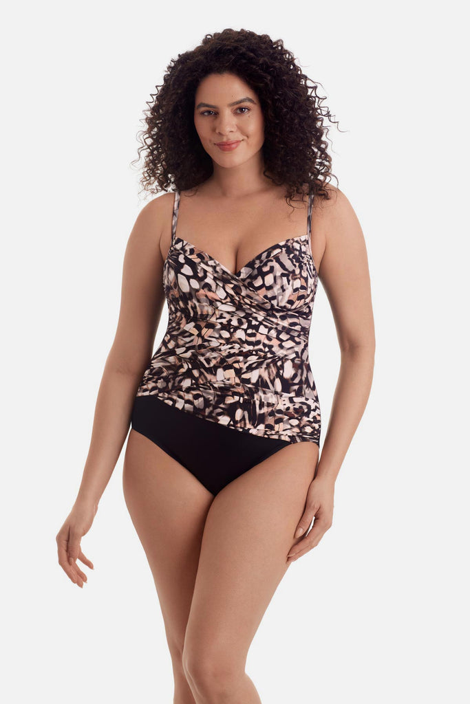 Woman wearing a brown butterfly wing printed one-piece swimsuit 