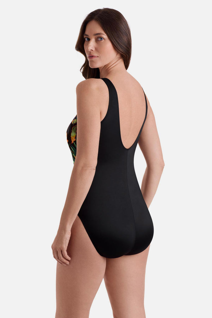 Woman turned left wearing a multicolor floral one-piece swimsuit 