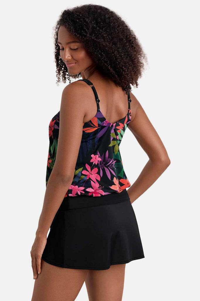 Woman turned left wearing a multicolored floral printed blouson tankini top