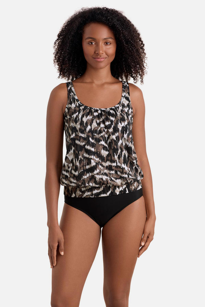 Woman wearing a brown animal skin-esque print blouson tankini top