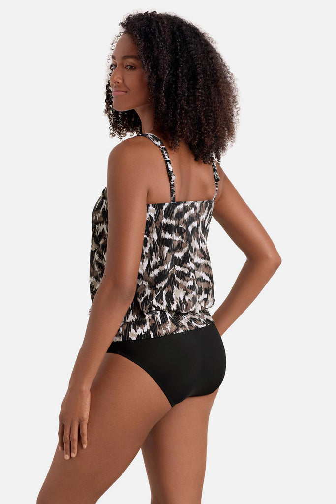 Woman turned left wearing a brown animal skin-esque print blouson tankini top