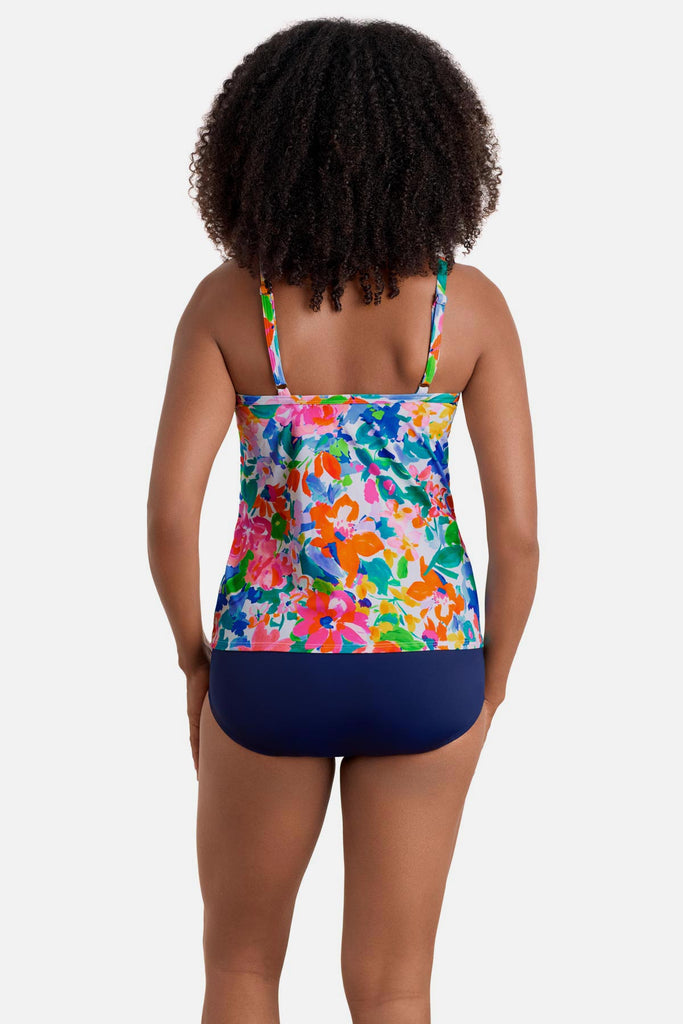 Woman turned away wearing a multicolored floral printed high neck tankini top
