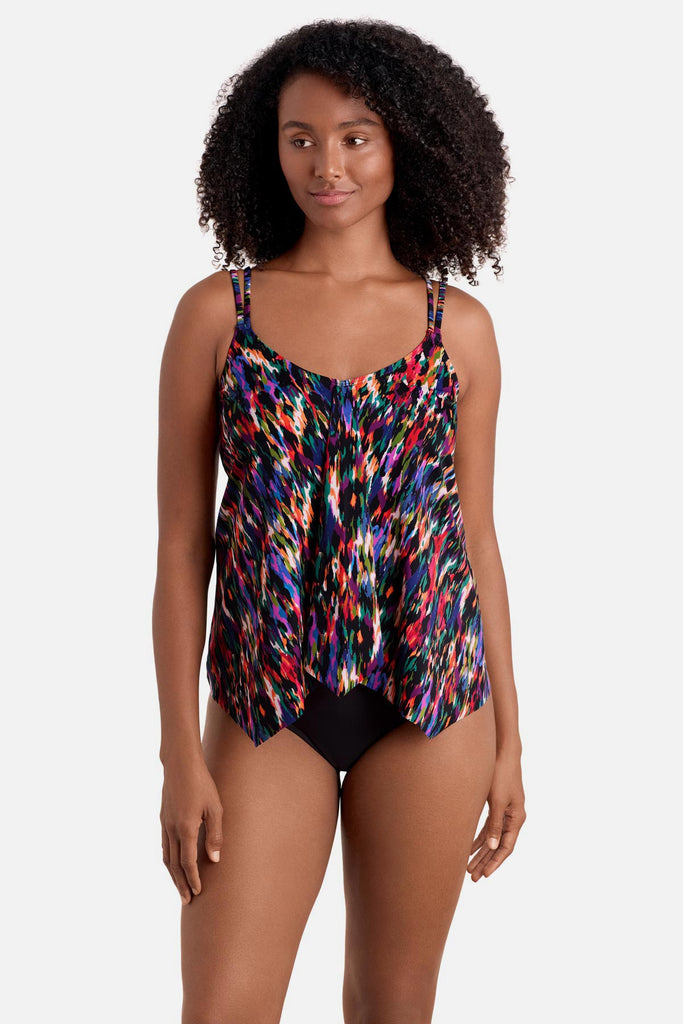 Woman wearing a multicolored abstract printed handkerchief tankini top