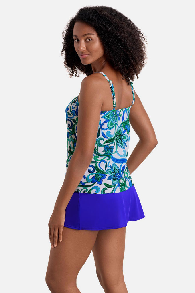 Woman turned left wearing a blue and green floral printed tankini top